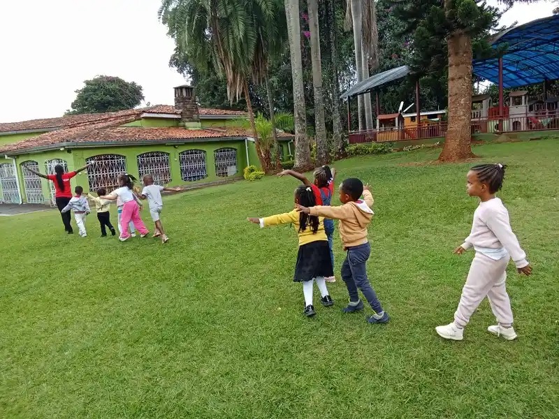 Children playing together on the grass